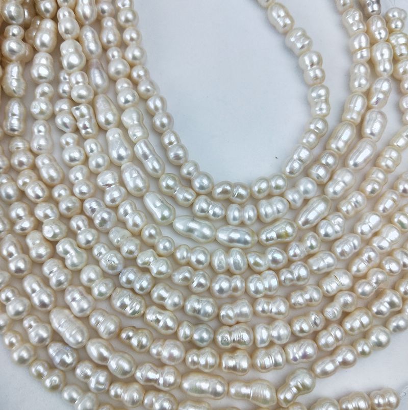 8-11mm Peanut Shape White Natural Pearl Beads Strand Freshwater Baroque Gourd Shape Pearls
8-11mm Peanut Shape White Natural Pearl Beads Strand Freshwater Baroque Gourd Shape Pearls