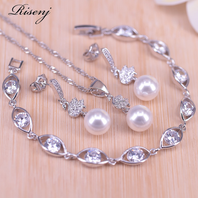 Earrings & Necklace White Pearl 925 Stamp Silver Color Jewelry Stud Earring Bracelet Set Wedding/Engagement Present In Store, As pic
Earrings & Necklace White Pearl 925 Stamp Silver Color Jewelry Stud Earring Bracelet Set Wedding/Engagement Present In Store, As pic