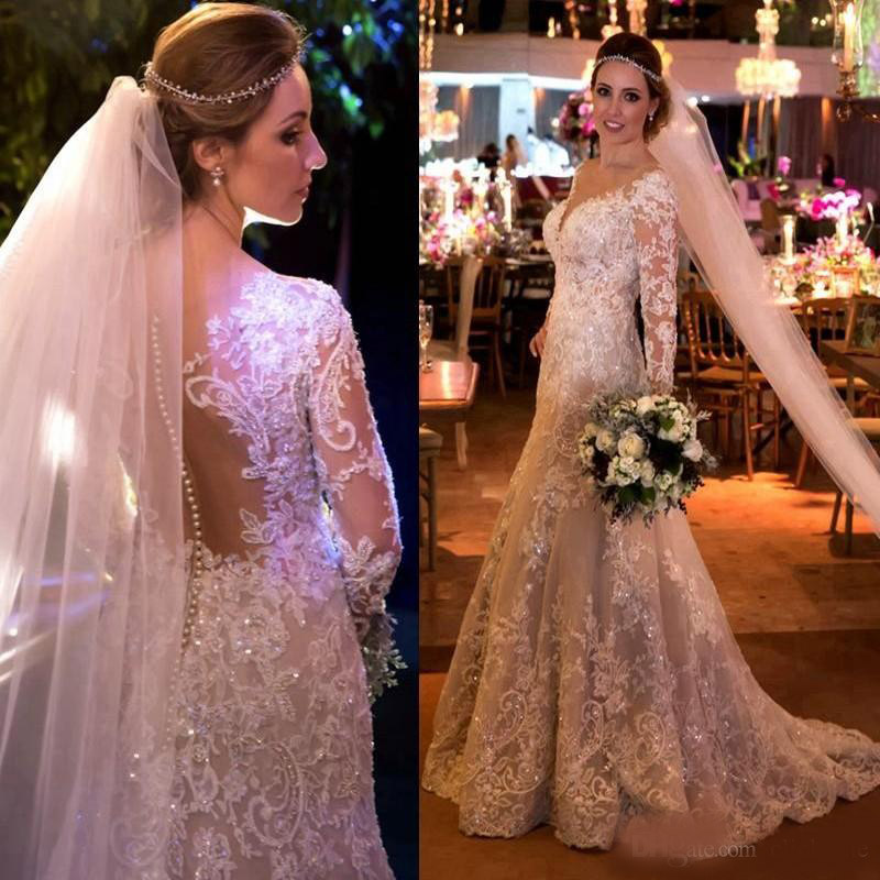 2020 Mermaid Lace Wedding Dresses With Appliques Sequins Long Sleeves Wedding Gowns Sweep Train Sheer Back Covered Buttons Bridal Dress