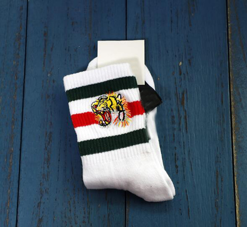 1 Pairs=2pcs Cotton Sports Socks For Men Tiger Style Knitted Famous Style Mens Male Socks White Black Grey Winter Mens Socks, Multi 
1 Pairs=2pcs Cotton Sports Socks For Men Tiger Style Knitted Famous Style Mens Male Socks White Black Grey Winter Mens Socks, Multi