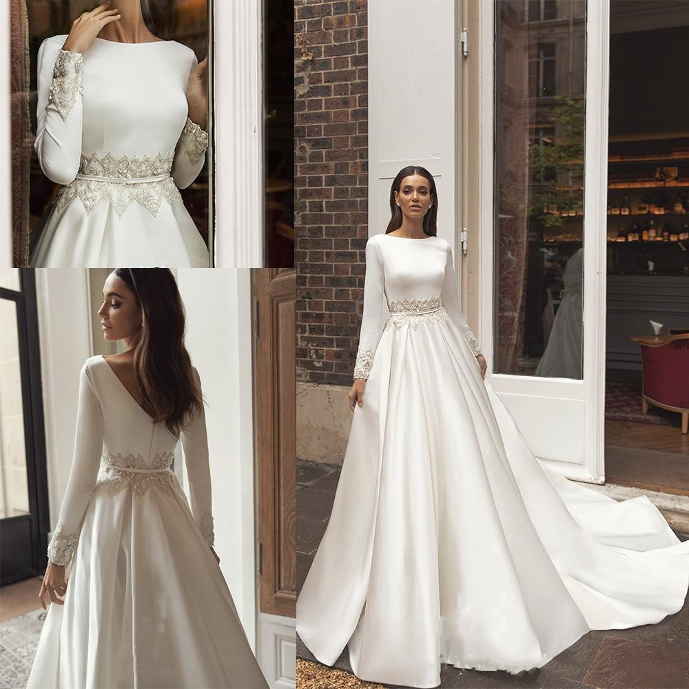 2020 New Satin A Line Wedding Dresses Applique Lace Jewel Neck Long Sleeves Bridal Dress Sweep Train Beach Country Wedding Gowns, Champagne
2020 New Satin A Line Wedding Dresses Applique Lace Jewel Neck Long Sleeves Bridal Dress Sweep Train Beach Country Wedding Gowns, Champagne