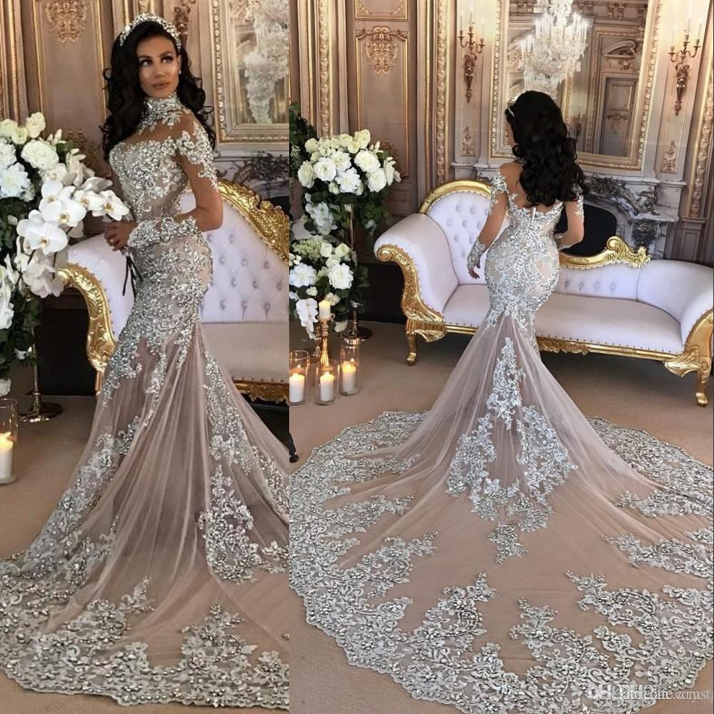 Arabic Sexy Mermaid Wedding Dresses High Neck Long Sleeves Illusion Lace Appliques Crystal Beaded Chapel Train Plus Size Custom Bridal Gowns, Ivory
Arabic Sexy Mermaid Wedding Dresses High Neck Long Sleeves Illusion Lace Appliques Crystal Beaded Chapel Train Plus Size Custom Bridal Gowns, Ivory