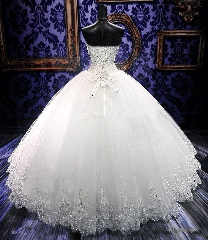2020 Sexy Bling Cheap A Line Wedding Dresses Sweetheart Sleeveless Lace Appliques Crystal Beaded Pearls Ball Gown Bow Formal Bridal Gowns