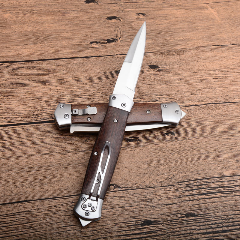 New Horizontal Automatic Tactical Folding Knife 8Cr13 Satin Blade Wood Handle Outdoor EDC Pocket Knives With Nylon Sheath free shipping
New Horizontal Automatic Tactical Folding Knife 8Cr13 Satin Blade Wood Handle Outdoor EDC Pocket Knives With Nylon Sheath free shipping