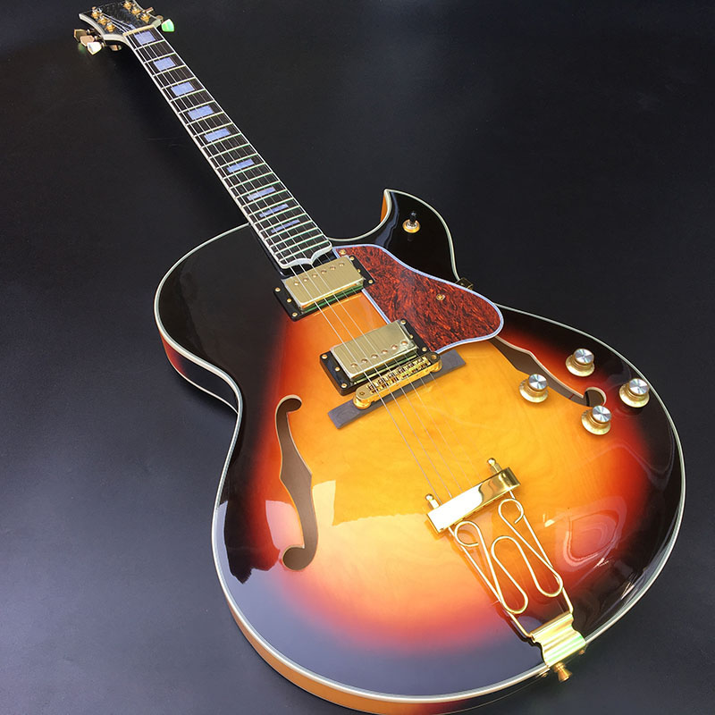 High-quality half-empty heart 6-string jazz electric guitar, arched top guitar transparent 3ts color, maple flame back, free shipping
High-quality half-empty heart 6-string jazz electric guitar, arched top guitar transparent 3ts color, maple flame back, free shipping