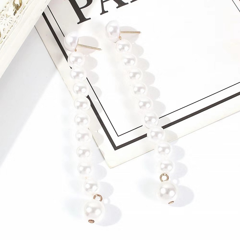 Wholesale- pearl beaded dangle earrings for women luxury designer pearls beads long danlging earring western fashion white jewelry love gift
Wholesale- pearl beaded dangle earrings for women luxury designer pearls beads long danlging earring western fashion white jewelry love gift