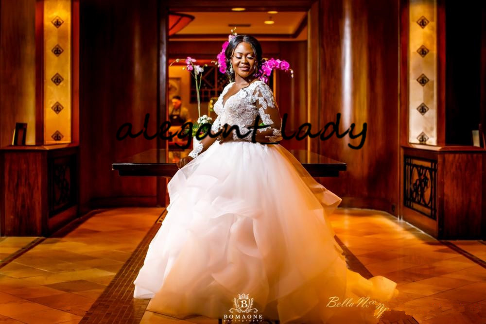 Plus Size Long Sleeve Wedding Dresses 2020 Modern V-neck Lace Applique Puffy Tiered Skirt Princess African Church Wedding Gown