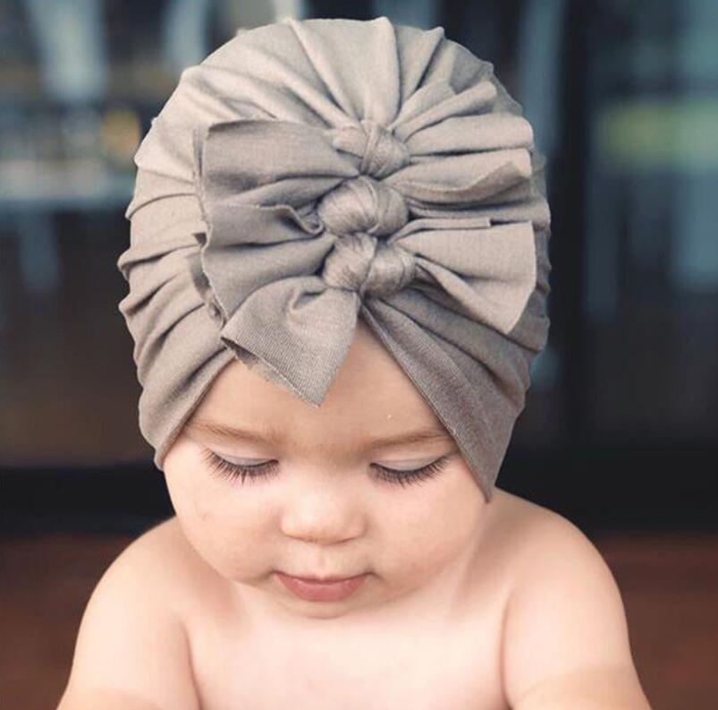 Baby Autumn and Winter New Soft Knitted Fabric Fold Bow Indian Cap 18 colors free shipping, As pic
Baby Autumn and Winter New Soft Knitted Fabric Fold Bow Indian Cap 18 colors free shipping, As pic