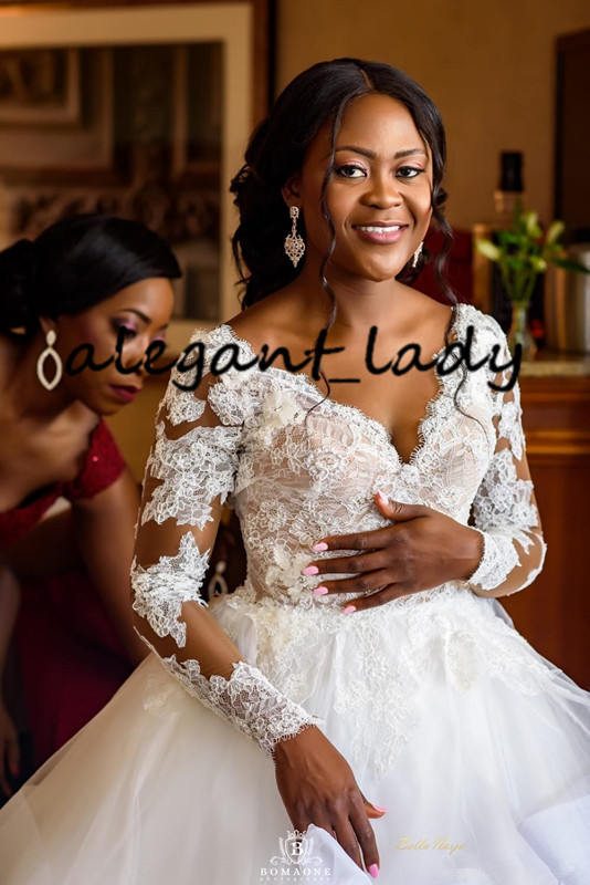Plus Size Long Sleeve Wedding Dresses 2020 Modern V-neck Lace Applique Puffy Tiered Skirt Princess African Church Wedding Gown