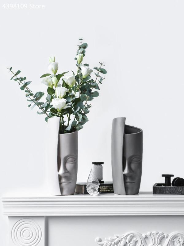 Creative ceramic abstract human face vase fashion art countertop vase Nordic home decoration wedding decoration
Creative ceramic abstract human face vase fashion art countertop vase Nordic home decoration wedding decoration