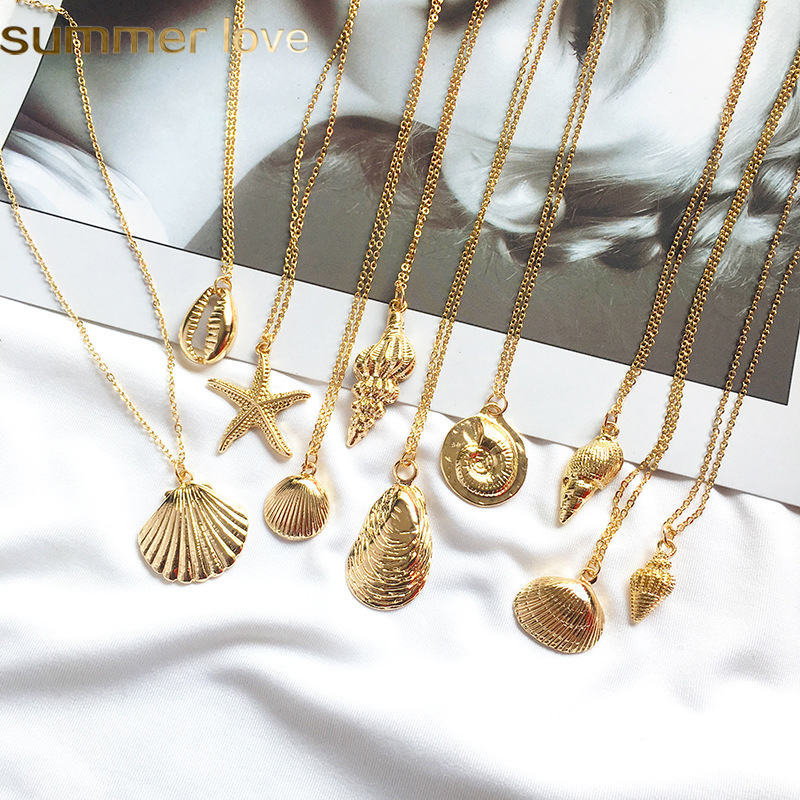 2019 New Fashion Gold Alloy Cowrie Shell Necklace for Women Conch Starfish Chain Pendant Necklace Summer Beach Jewelry Gift
2019 New Fashion Gold Alloy Cowrie Shell Necklace for Women Conch Starfish Chain Pendant Necklace Summer Beach Jewelry Gift