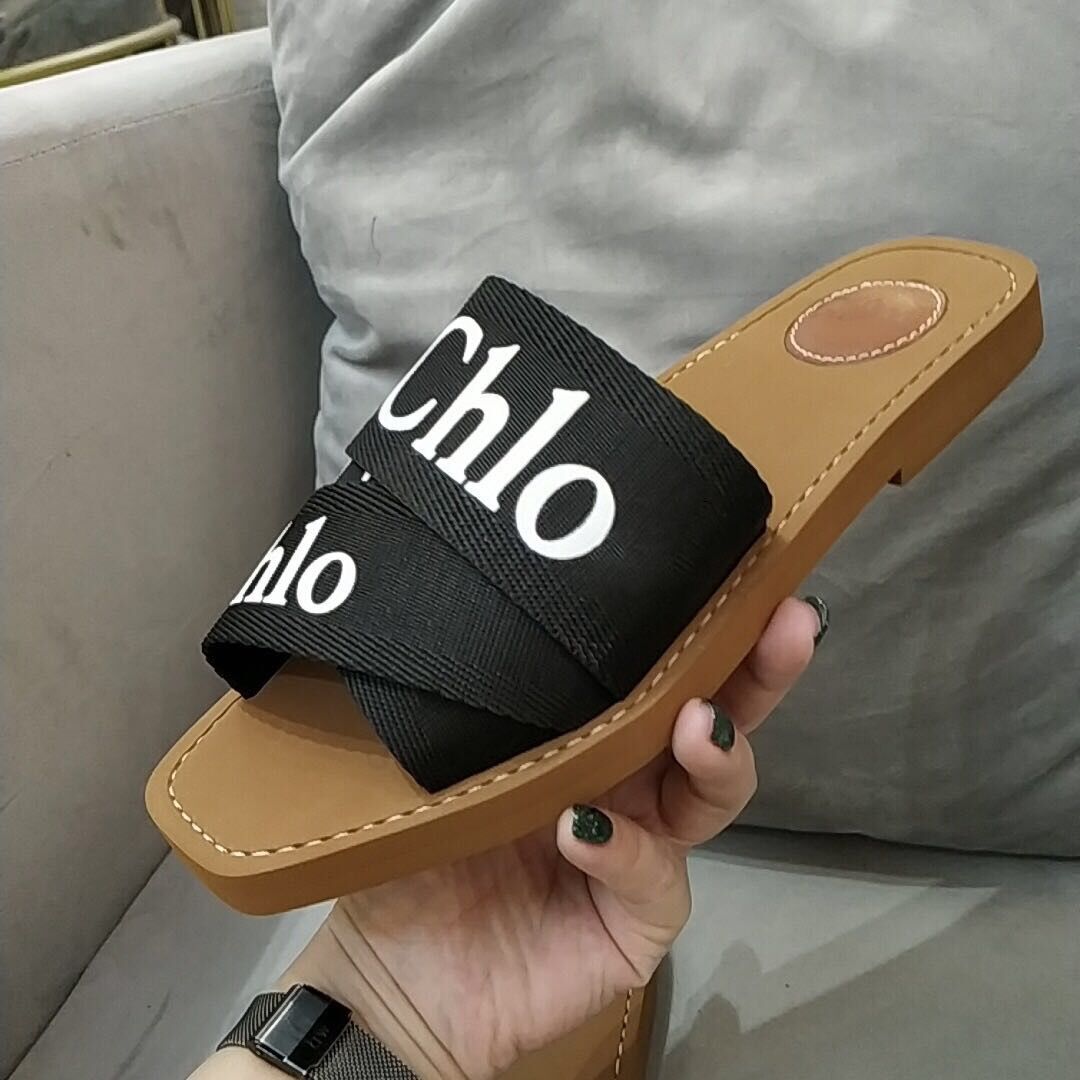 2020 Newest Branded Women Woody Mules Fflat Slipper Deisgner Lady Lettering Fabric Outdoor Leather Sole Slide Sandal, White
2020 Newest Branded Women Woody Mules Fflat Slipper Deisgner Lady Lettering Fabric Outdoor Leather Sole Slide Sandal, White