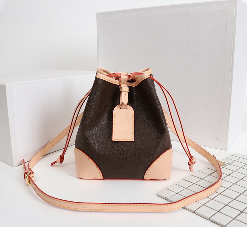 Designer handbag fashion ladies shoulder bag diagonal package high quality leather luxury bucket bag L flower new free shipping, White-orange
Designer handbag fashion ladies shoulder bag diagonal package high quality leather luxury bucket bag L flower new free shipping, White-orange