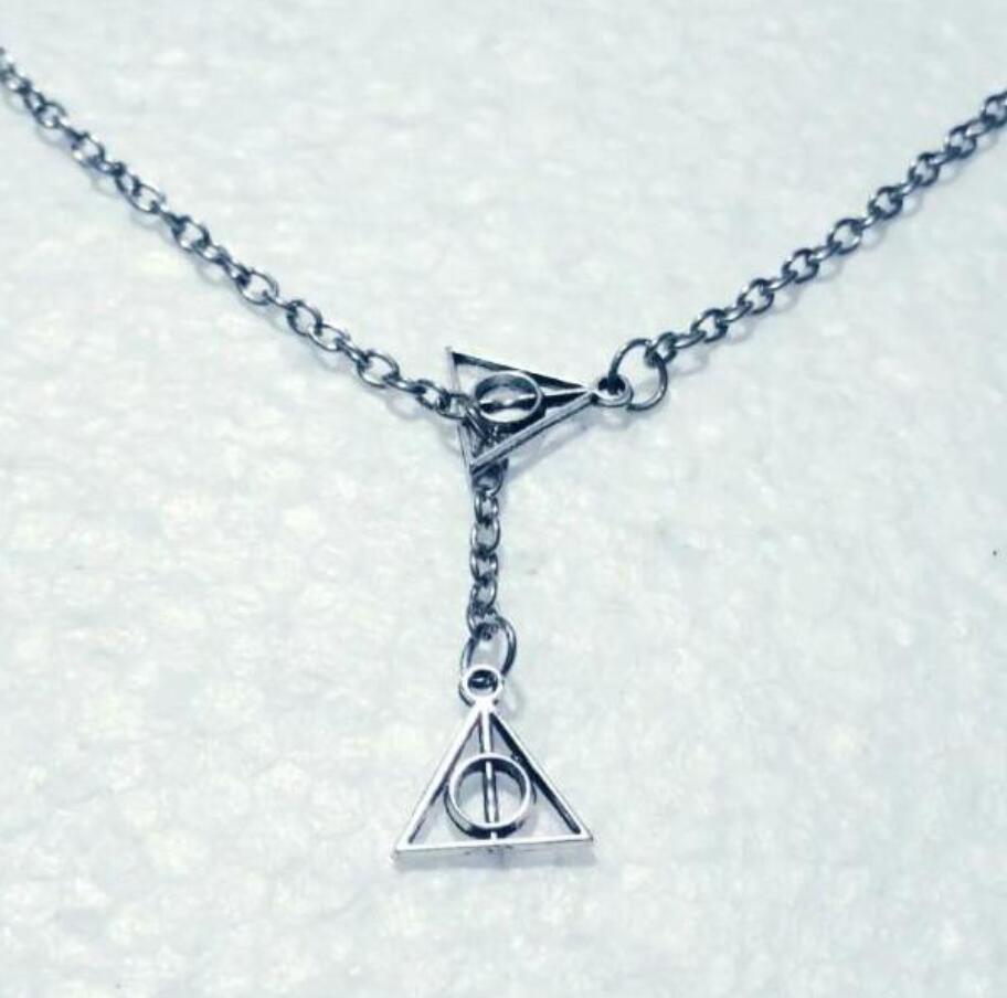 New Triangle Movie Trendy Jewelry Antique Silver The Deathly Hallows Charm Double Cross Pendant Adjustable Lariat Chain Necklace 872
New Triangle Movie Trendy Jewelry Antique Silver The Deathly Hallows Charm Double Cross Pendant Adjustable Lariat Chain Necklace 872