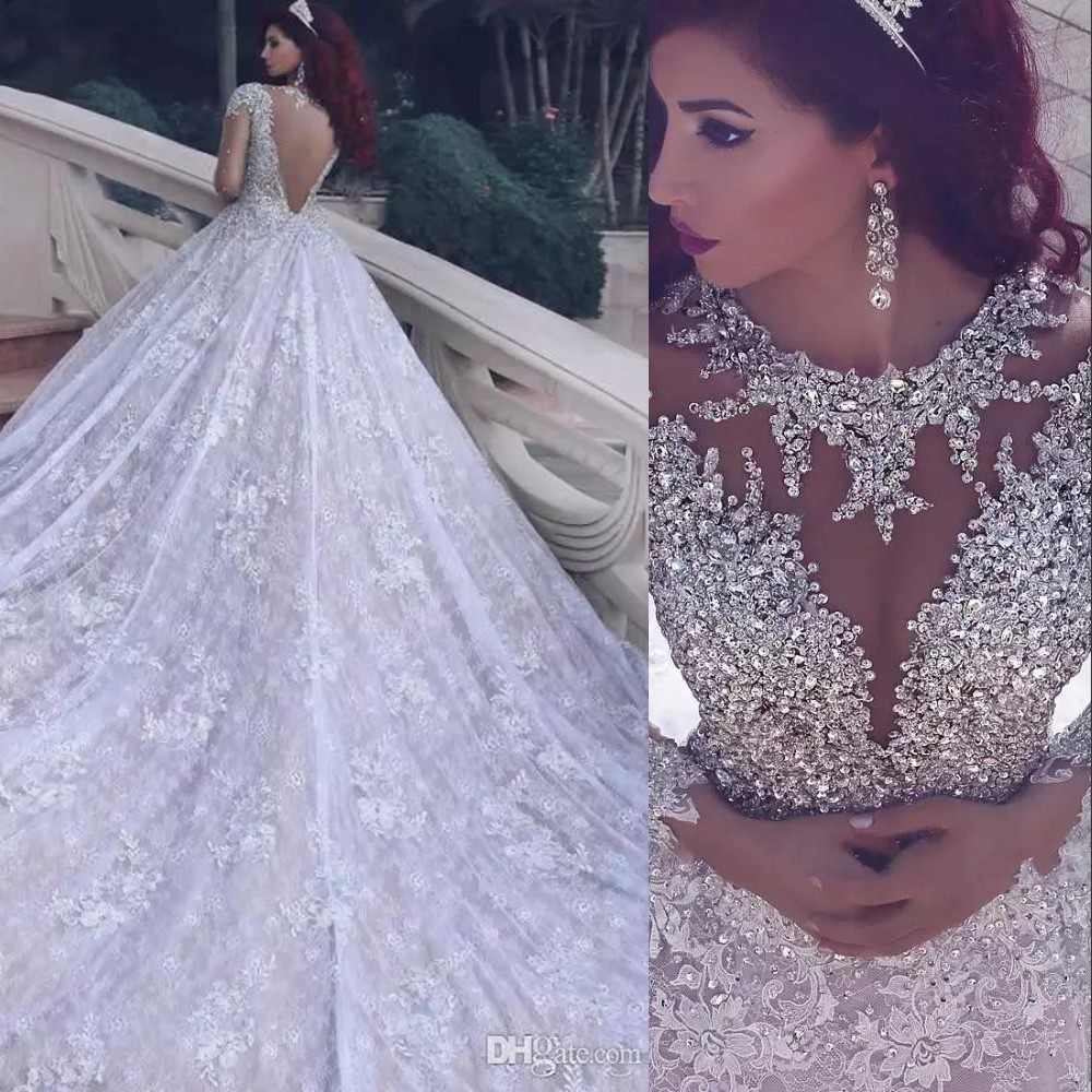 Sexy Arabic A Line Wedding Dresses Jewel Neck Long Sleeves Full Lace Appliques Silver Crystal Sheer Back Plus Size Chapel Train Bridal Gowns, Same as image
Sexy Arabic A Line Wedding Dresses Jewel Neck Long Sleeves Full Lace Appliques Silver Crystal Sheer Back Plus Size Chapel Train Bridal Gowns, Same as image