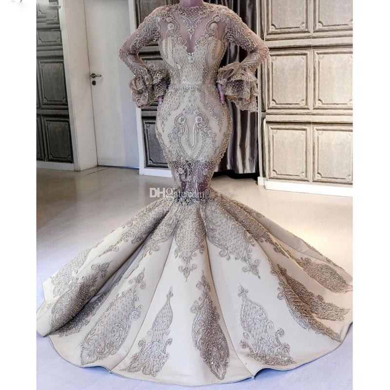 Amazing Mermaid Lace Appliques Evening Dresses Jewel Neck Poet Long Sleeve Bead Dubai Prom Gowns Ruffles Bottom Formal Party Dress