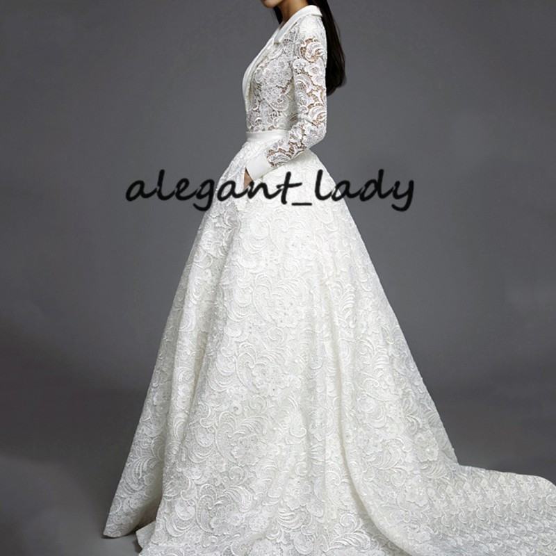 Vintage Crochet Lace Wedding Dresses with Pocket Design 2019 Sexy V-neck Long Sleeve Puffy Skirt Arabic Castle Bridal Wear for Wedding