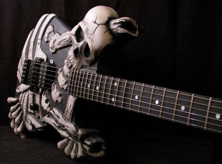 Hand carved J Frog George Lynch Skull and Bones Electric Guitar Full floating Genuine Floyd Rose Tremolo, Ebony Fingerboard, Korean Hardware
Hand carved J Frog George Lynch Skull and Bones Electric Guitar Full floating Genuine Floyd Rose Tremolo, Ebony Fingerboard, Korean Hardware