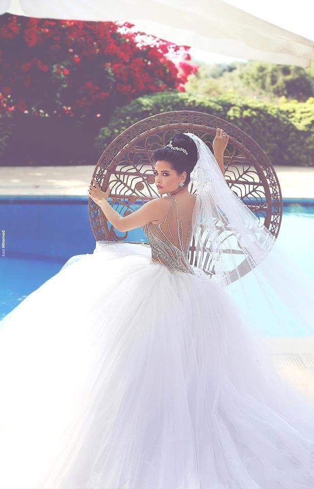 Gorgeous Major Beading Crystals Ball Gown 2020 Wedding Dresses Crew Sheer Neck Sexy Back Puff Tulles Bridal Gowns Arabic