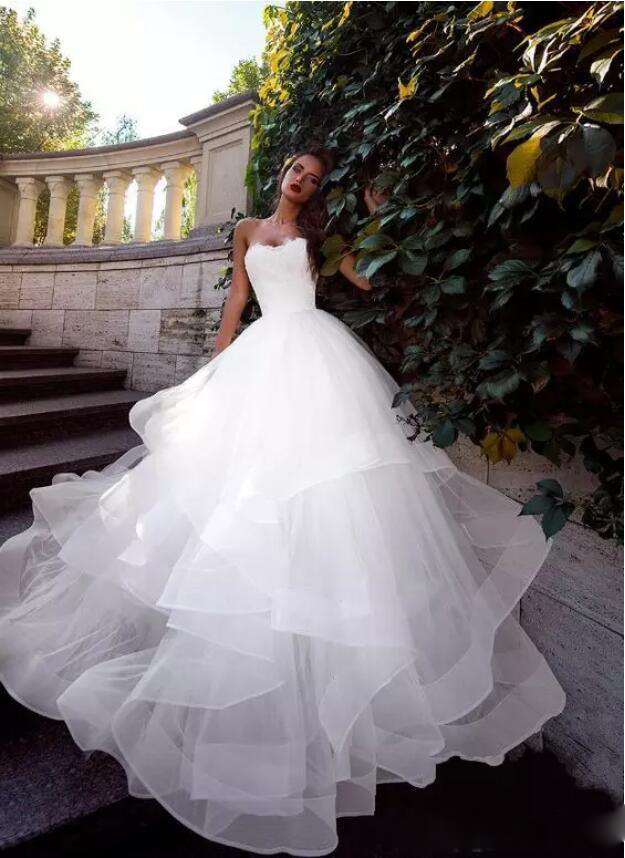 2020 Modest Elegant Sweetheart Pick Up Sleeveless A Line Wedding Dresses Lace Cascading Ruffles Wedding Gowns Sweep Train Bridal Gown