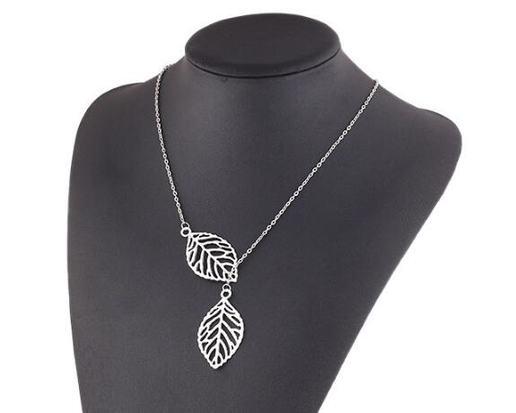Fashion-Punk Gold Hollow Two Leaf Leaves Pendant Necklace Clavicle Chain Simple European New Fashion Charm Jewelry Women Christmas Gift