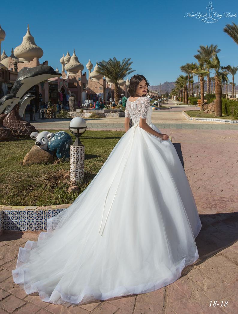 Line Amazing A Wedding Dresses Sheer Bateau Neck Short Sleeves Beaded Bridal Gowns Tulle Sweep Train Robe De Marie