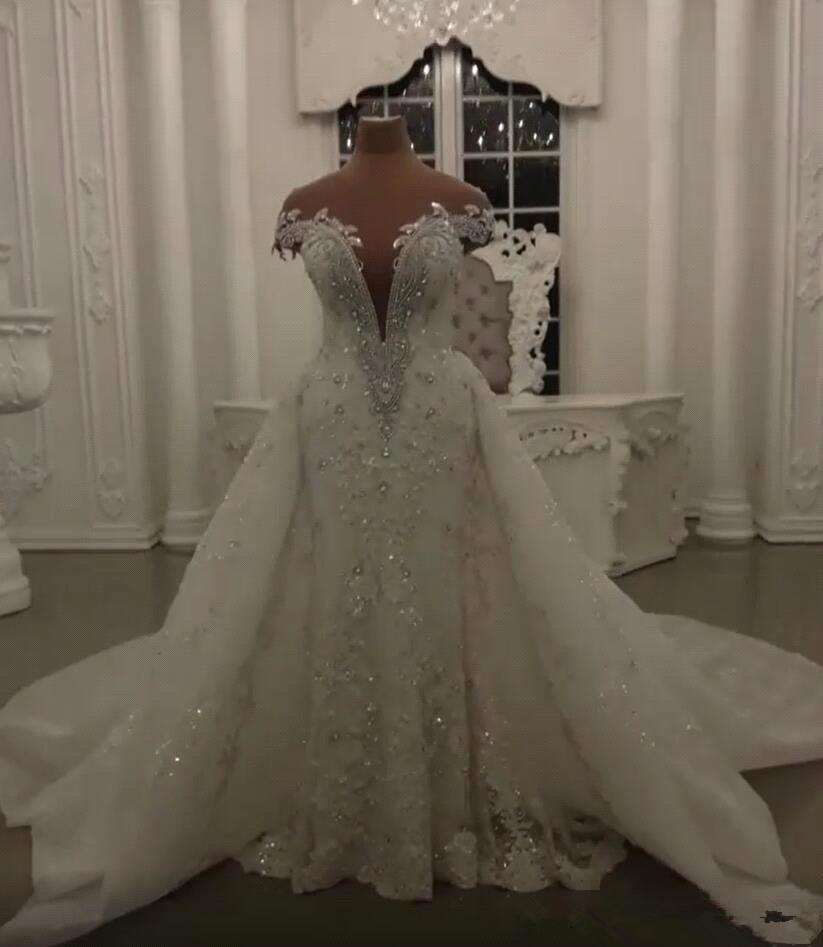 luxury Mermaid Wedding Dresses with Detachable Skirt Shining Sequins Crystals Bead Appliques off the shoulder african Long Bridal Gowns, White
luxury Mermaid Wedding Dresses with Detachable Skirt Shining Sequins Crystals Bead Appliques off the shoulder african Long Bridal Gowns, White