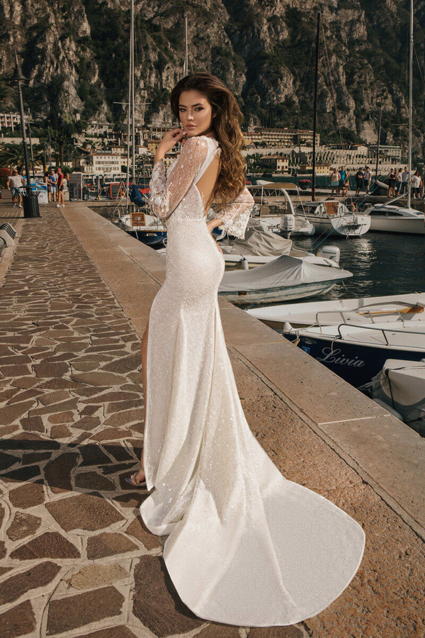 2020 Mermaid Wedding Dresses Jewel Neck Appliqued Beaded Sequins Long Sleeves Bridal Gown Backless Ruffled Front Split Vestidos De Novia