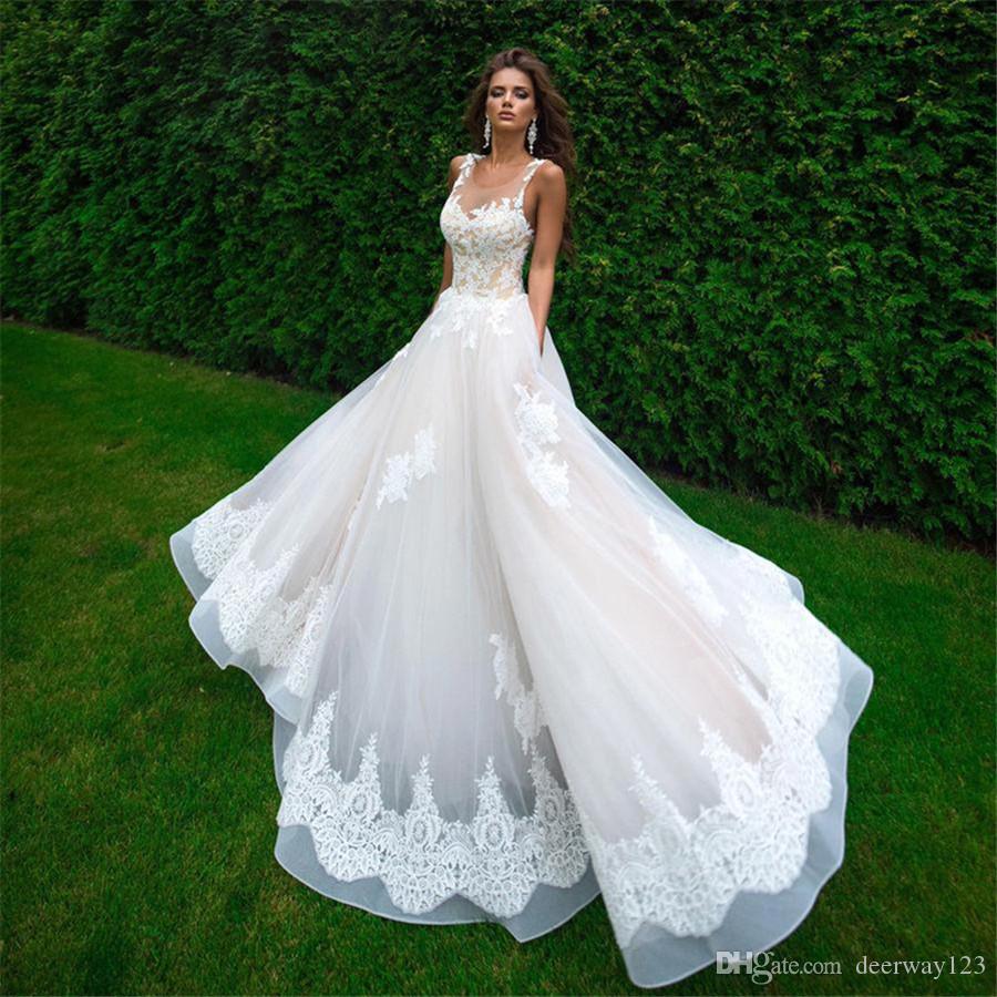 Floor length A-Line Applique Bridal Gown Vestido De Noiva Robe De Mariage High Quality Champagne and Ivory Sheer Top Wedding Dresses 2020 Ne, Same as image
Floor length A-Line Applique Bridal Gown Vestido De Noiva Robe De Mariage High Quality Champagne and Ivory Sheer Top Wedding Dresses 2020 Ne, Same as image