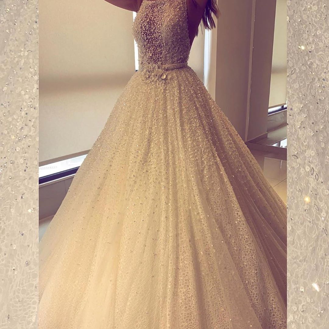 2020 Spaghetti A Line Bridal Gowns Backless Sweep Train Sequins Pearls Beading Rhinestone Wedding Dresses 3D Floral Appliques Abiti Da Sposa