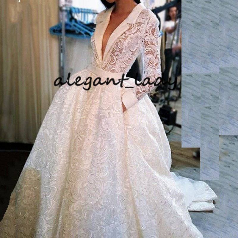 Vintage Crochet Lace Wedding Dresses with Pocket Design 2019 Sexy V-neck Long Sleeve Puffy Skirt Arabic Castle Bridal Wear for Wedding