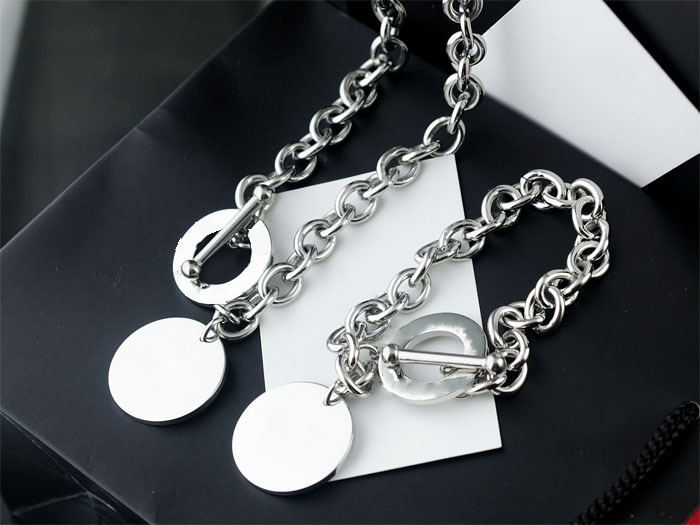 2019 high quality silver thick chian silver round plate rings stainless steel Pendant Necklaces and bracelet suit with box and dastbag
2019 high quality silver thick chian silver round plate rings stainless steel Pendant Necklaces and bracelet suit with box and dastbag