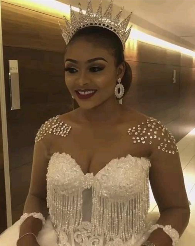 Luxury Crystal Princess Ball Gown Wedding Dresses 2021 Illusion Long Sleeve Open Back Lace Beading Tassel Dress Arabic Dubai Bridal Gowns