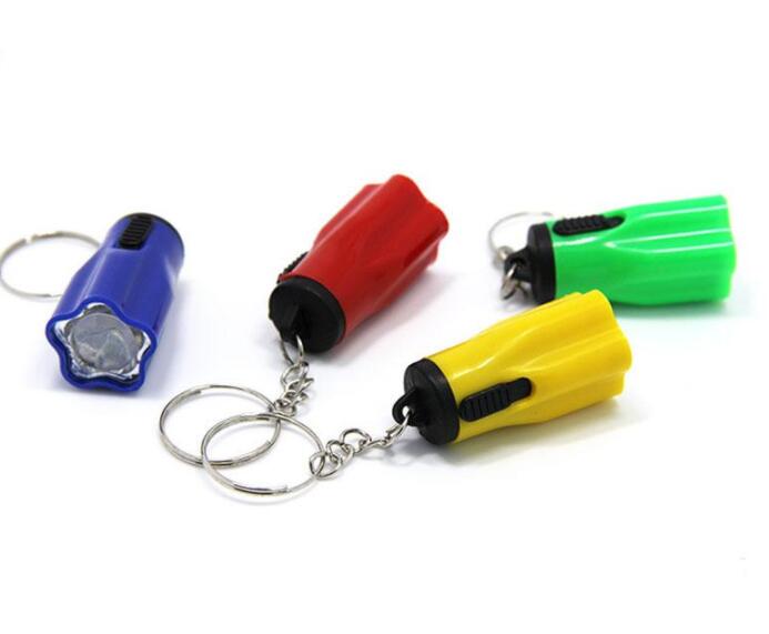 Plastic Led Flsahlights Super Mini Tazer With Key Ring Portable For Outdoor Camping Hiking Torch Flower Petal Shape Designer Y0017
Plastic Led Flsahlights Super Mini Tazer With Key Ring Portable For Outdoor Camping Hiking Torch Flower Petal Shape Designer Y0017