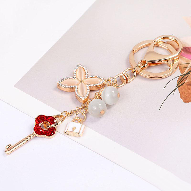 Key Lock Ring Lovers Keyring Rhinestone Opal Four leaf Clover Keychains Holder Fashion Bag Pendant Car Charms Key Chains Jewelry Accessories