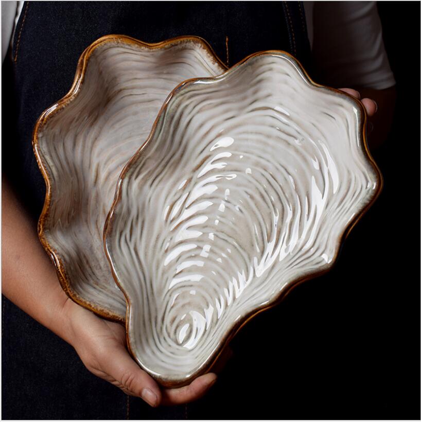 ceramic tableware special plate shell plate dish plates creative personality irregular Western food plates fruit salad plate
ceramic tableware special plate shell plate dish plates creative personality irregular Western food plates fruit salad plate
