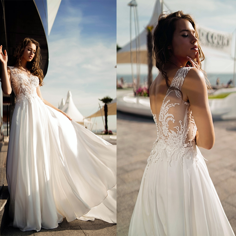 Sexy A Line Tanya Grig Bohemian Dresses V Neck Sleeveless Tulle Lace Appilque Button Ruched Wedding Gowns Sweep Train robe de mariée, Blue
Sexy A Line Tanya Grig Bohemian Dresses V Neck Sleeveless Tulle Lace Appilque Button Ruched Wedding Gowns Sweep Train robe de mariée, Blue