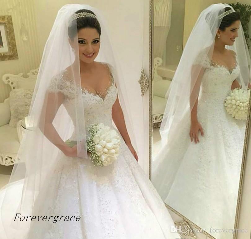 2019 New Graceful Ball Gown Wedding Dress Vintage Pricness Cap Sleeves Off Shoulder Appliqued Arabic Dubai Bridal Gown Custom Made Plus Size, Silver
2019 New Graceful Ball Gown Wedding Dress Vintage Pricness Cap Sleeves Off Shoulder Appliqued Arabic Dubai Bridal Gown Custom Made Plus Size, Silver