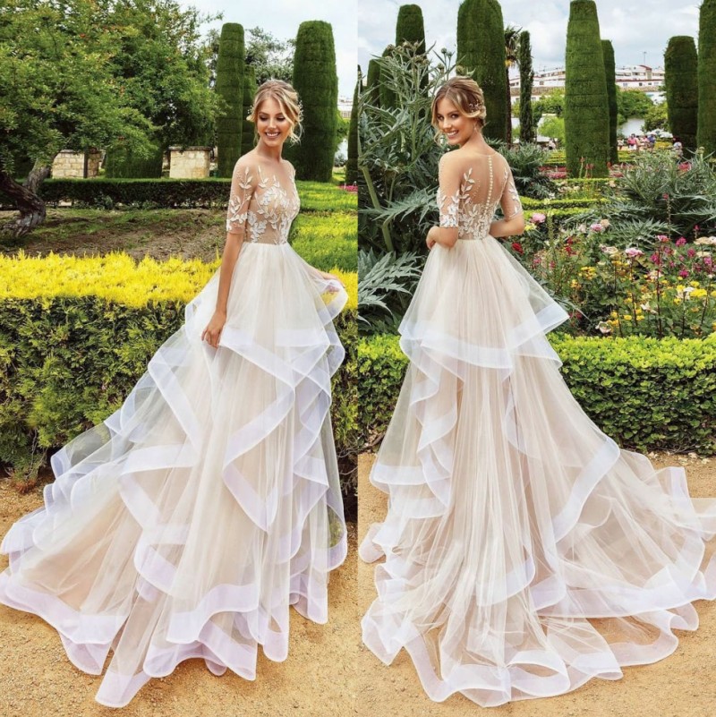 A Fabulous Beaded Line Lace Wedding Dresses Sheer Bateau Neck Appliqued Half Sleeves Bridal Gowns Tiered Sweep Train Tulle Robe De Marie ppliqued
