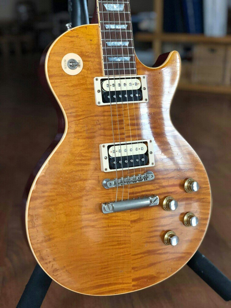 1959 Relic Slash #5 AFD MURPHY AGED SIGNED Appetite For Destruction Flame Maple Top Electric Guitar One Piece Body & Neck, Little Pin Bridge
1959 Relic Slash #5 AFD MURPHY AGED SIGNED Appetite For Destruction Flame Maple Top Electric Guitar One Piece Body & Neck, Little Pin Bridge