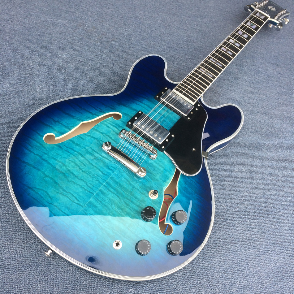 Custom Shop Bule Burst color Quilte Maple top,Semi Hollow Body Jazz Electric Guitar Black Pickguard,12 string guitar190127
Custom Shop Bule Burst color Quilte Maple top,Semi Hollow Body Jazz Electric Guitar Black Pickguard,12 string guitar190127