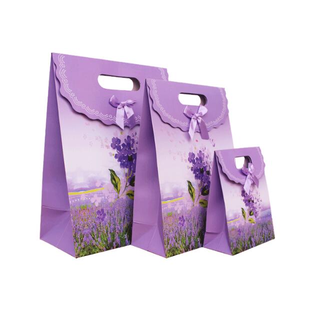 12*6*16cm purple small paper bag for gift packaging pink paper gift bag 
12*6*16cm purple small paper bag for gift packaging pink paper gift bag