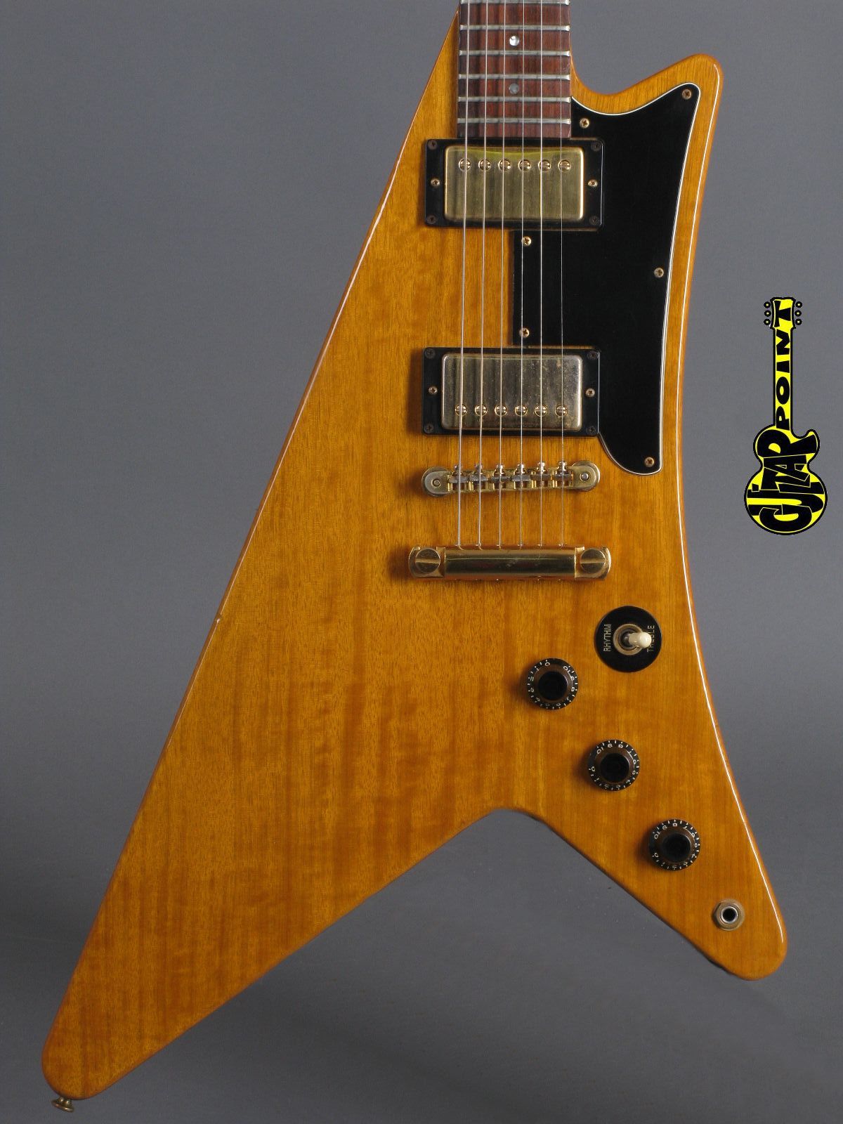 Rare Moderne Korina 1958 Reissue Heritage 1982 Natural Flying V Electric Guitar Boat paddle Gumby style headstock, Dot Inlay, Gold Hardware
Rare Moderne Korina 1958 Reissue Heritage 1982 Natural Flying V Electric Guitar Boat paddle Gumby style headstock, Dot Inlay, Gold Hardware
