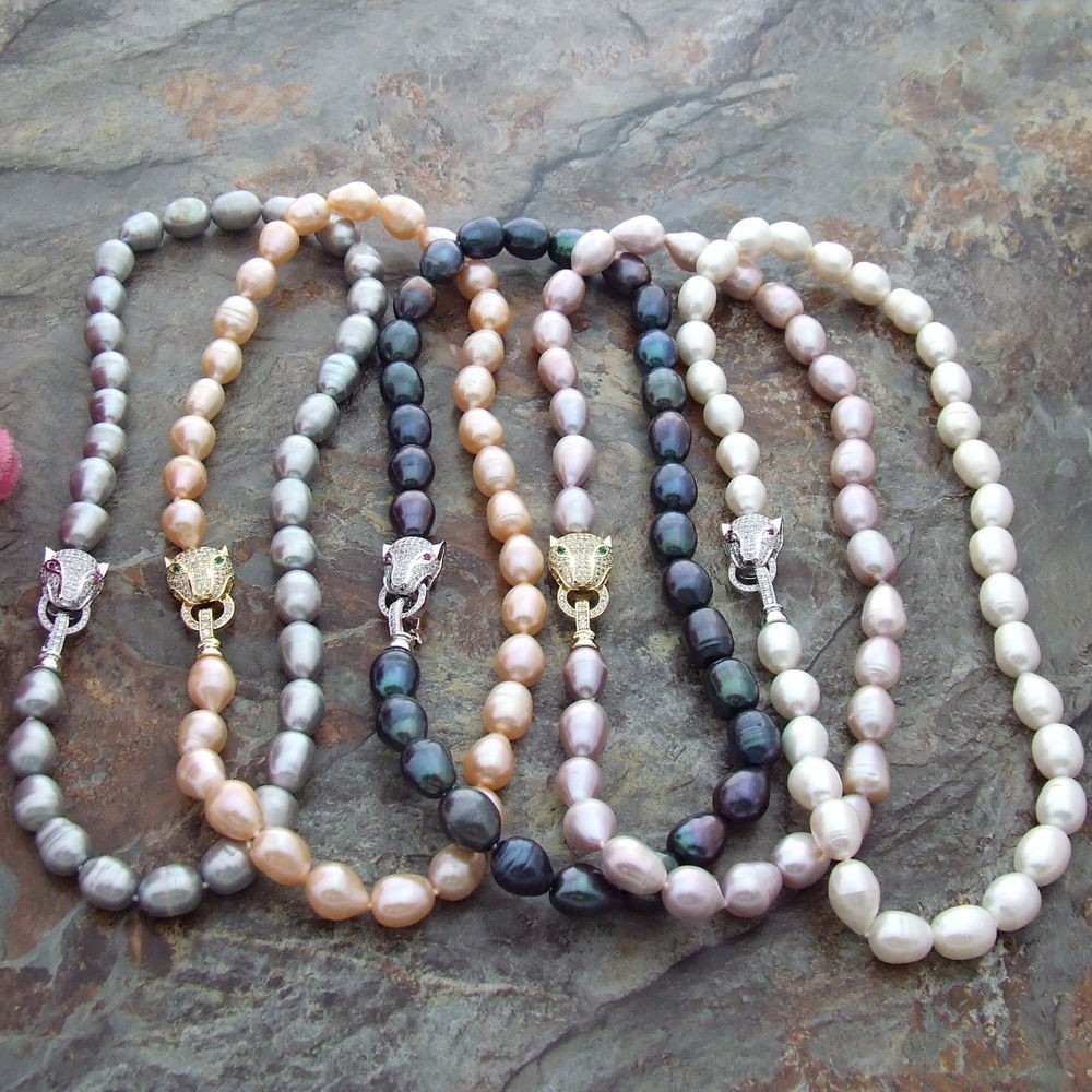 Hand knotted 10-12mm white black gray pink purple freshwater rice pearl leopard head micro inlay zircon necklace long 43cm
Hand knotted 10-12mm white black gray pink purple freshwater rice pearl leopard head micro inlay zircon necklace long 43cm