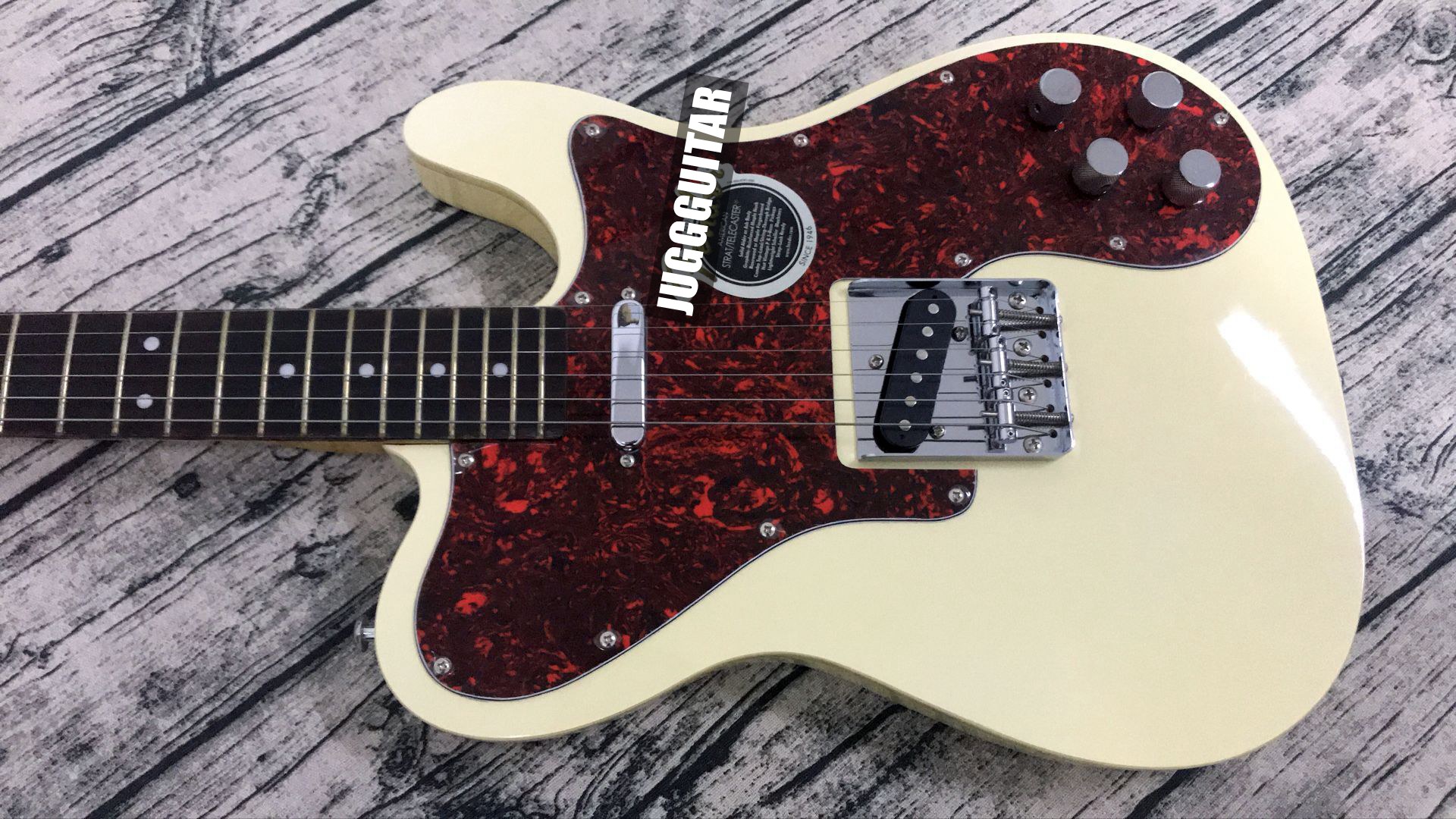 Custom Shop 72 Tele Deluxe Thin line TL Cream White Electric Guitar Single Coil Neck Pickup, Red Pearl Pickguard, String Thru Body Bridge
Custom Shop 72 Tele Deluxe Thin line TL Cream White Electric Guitar Single Coil Neck Pickup, Red Pearl Pickguard, String Thru Body Bridge