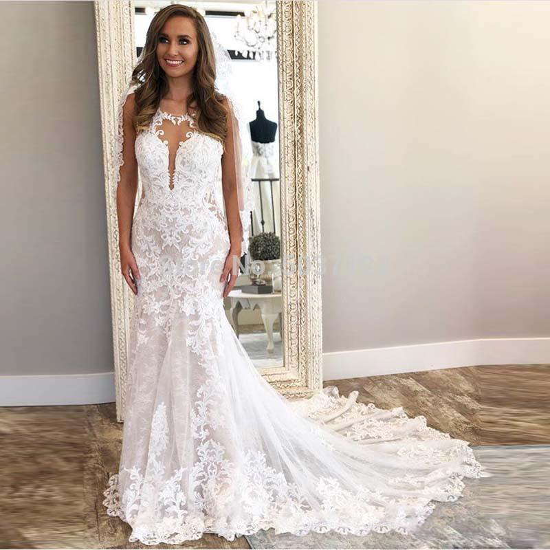 Backless Stylish Mermaid Wedding Dresses Appliqued Sheer Plunging Neck Bridal Gowns Sweep Train Trumpet Robe De Marie