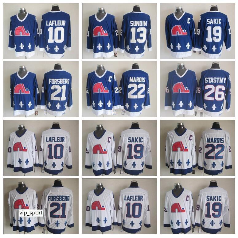 Quebec Nordiques Hockey 13 Mats Sundin 19 Joe Sakic Jersey 21 Peter Forsberg 26 Peter Stastny 10 Guy Lafleur 22 Mario Marois, Black;red
Quebec Nordiques Hockey 13 Mats Sundin 19 Joe Sakic Jersey 21 Peter Forsberg 26 Peter Stastny 10 Guy Lafleur 22 Mario Marois, Black;red