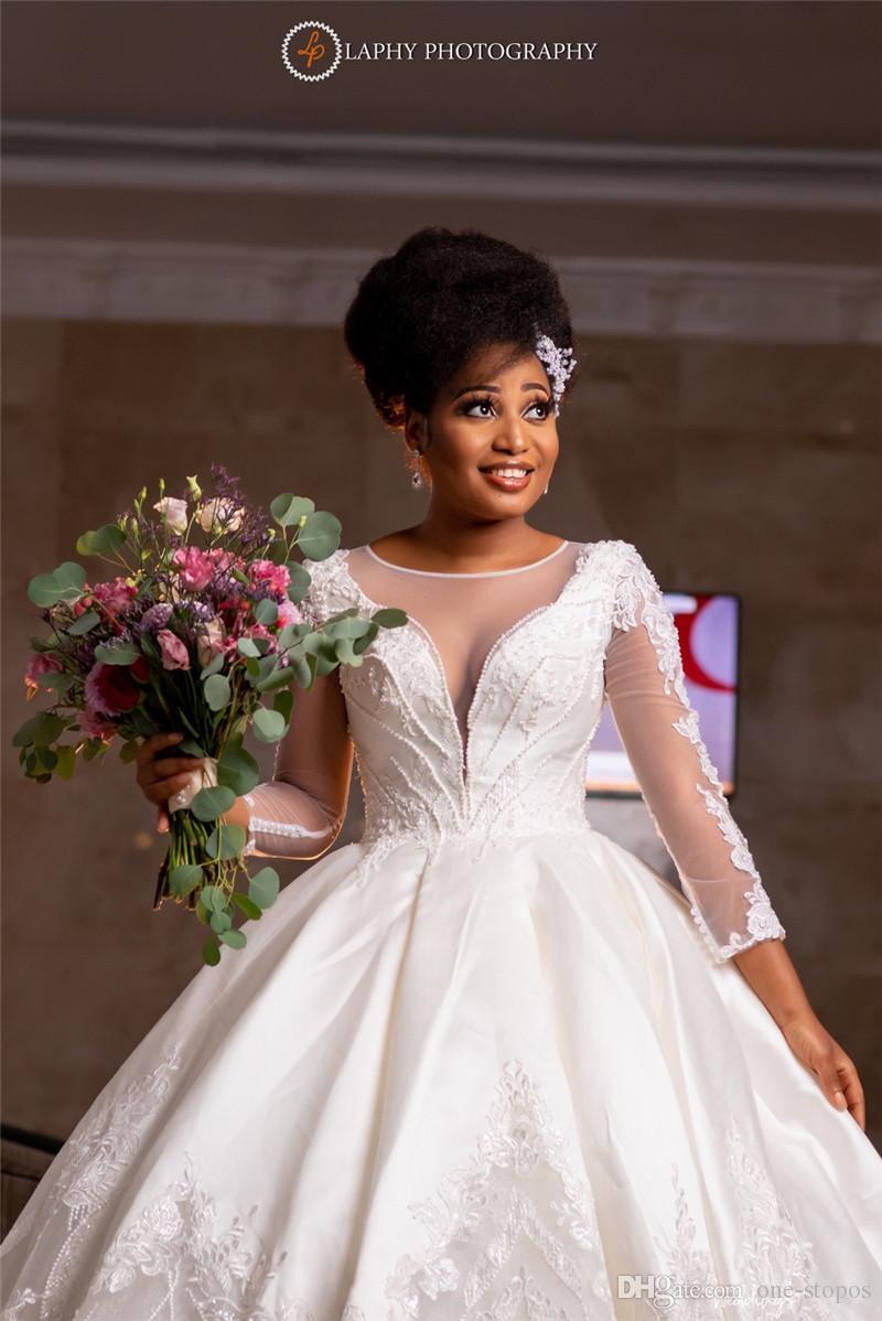 Mondern Dubai Arabic African Plus Size Ball Gown Dresses Beaded Sheer Neck Long Sleeevs Crystals Pearls Wedding Dress Bridal Gowns