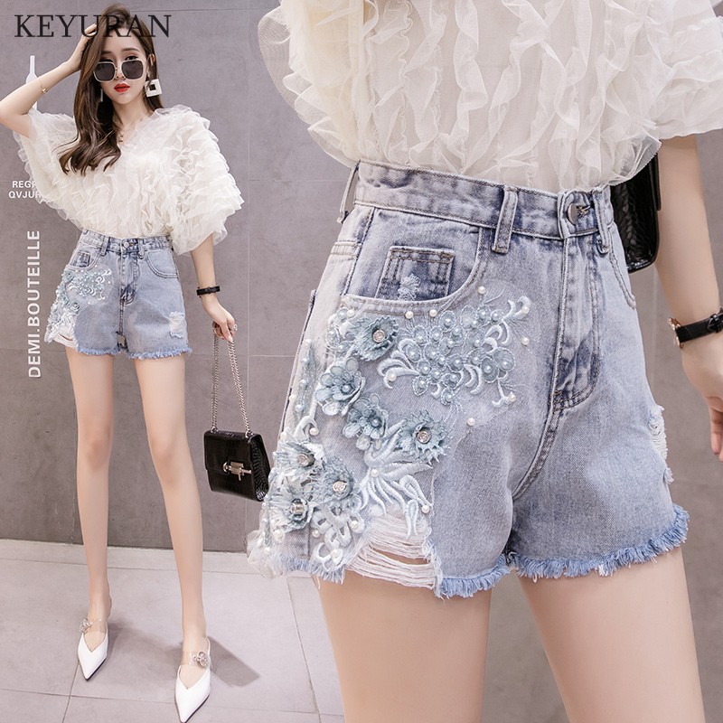 Summer Fashion Women High Waist Pearls Beading Wide Leg Denim Shorts Woman 3D Flower Embroidered Tassel Hot Jeans Shorts L3390, Blue
Summer Fashion Women High Waist Pearls Beading Wide Leg Denim Shorts Woman 3D Flower Embroidered Tassel Hot Jeans Shorts L3390, Blue