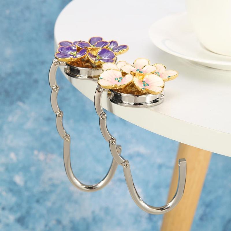 Zinc Alloy Foldable Bag Hook Flower Shape Handbag Holder Desk Hooks Purse Hanger For Table Edges In Hotels Restaurants Cafes
Zinc Alloy Foldable Bag Hook Flower Shape Handbag Holder Desk Hooks Purse Hanger For Table Edges In Hotels Restaurants Cafes